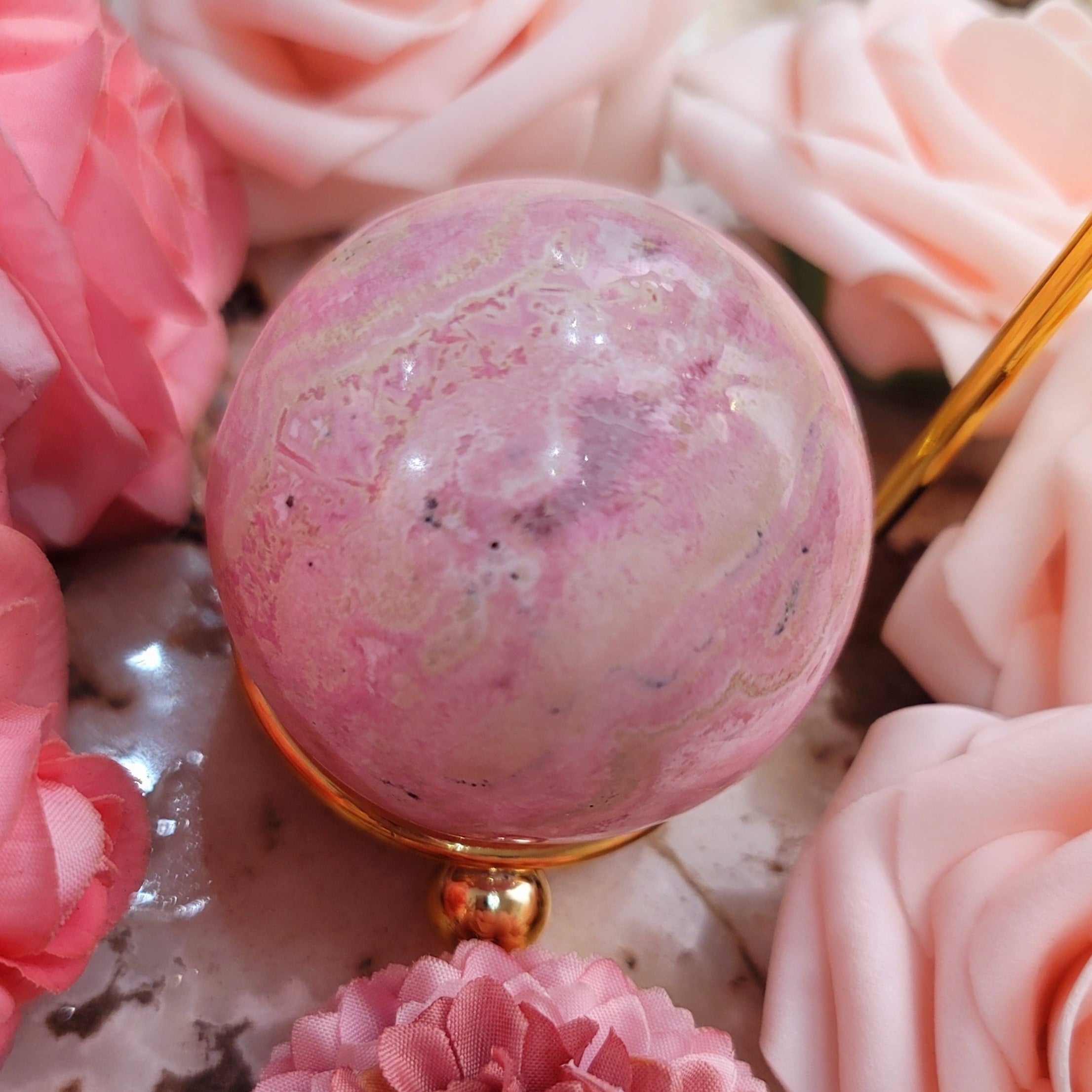Rhodonite Sphere for Attraction, Romance and Self Worth
